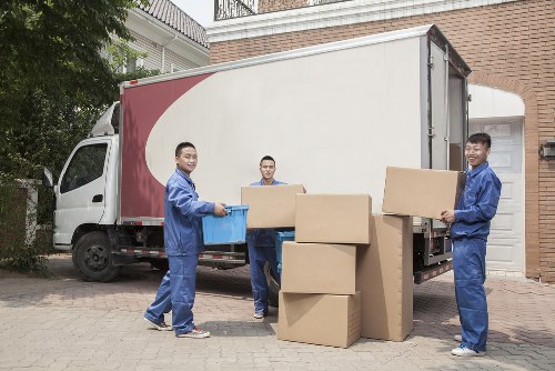 Removal van loading in West Hampstead street setting