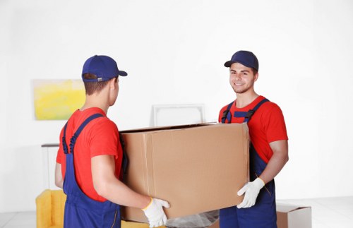 Packing boxes and materials for a move in West Hampstead