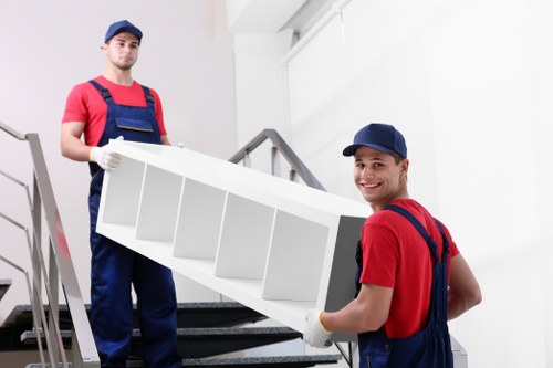 Removal team preparing a move in a West Hampstead residential street