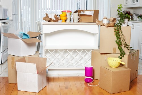 Packed boxes and furniture ready for storage near West Hampstead