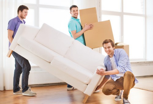 Careful unpacking of boxes in a West Hampstead flat