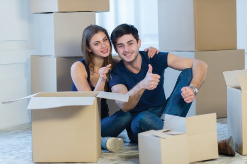Packing and loading belongings into a local moving van