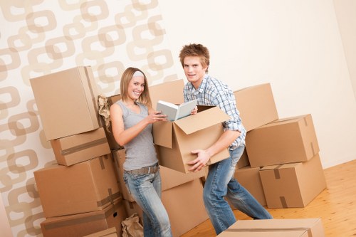 Professional movers handling household items for a local relocation
