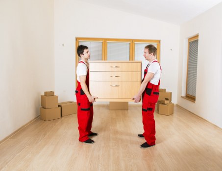 Packed boxes and furniture prepared for a student move in West Hampstead